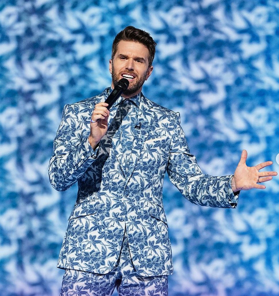 Joel Dommett's Dapper Looks: Gresham Blake's Bespoke Brilliance on ITV's The Masked Singer - Gresham Blake Online