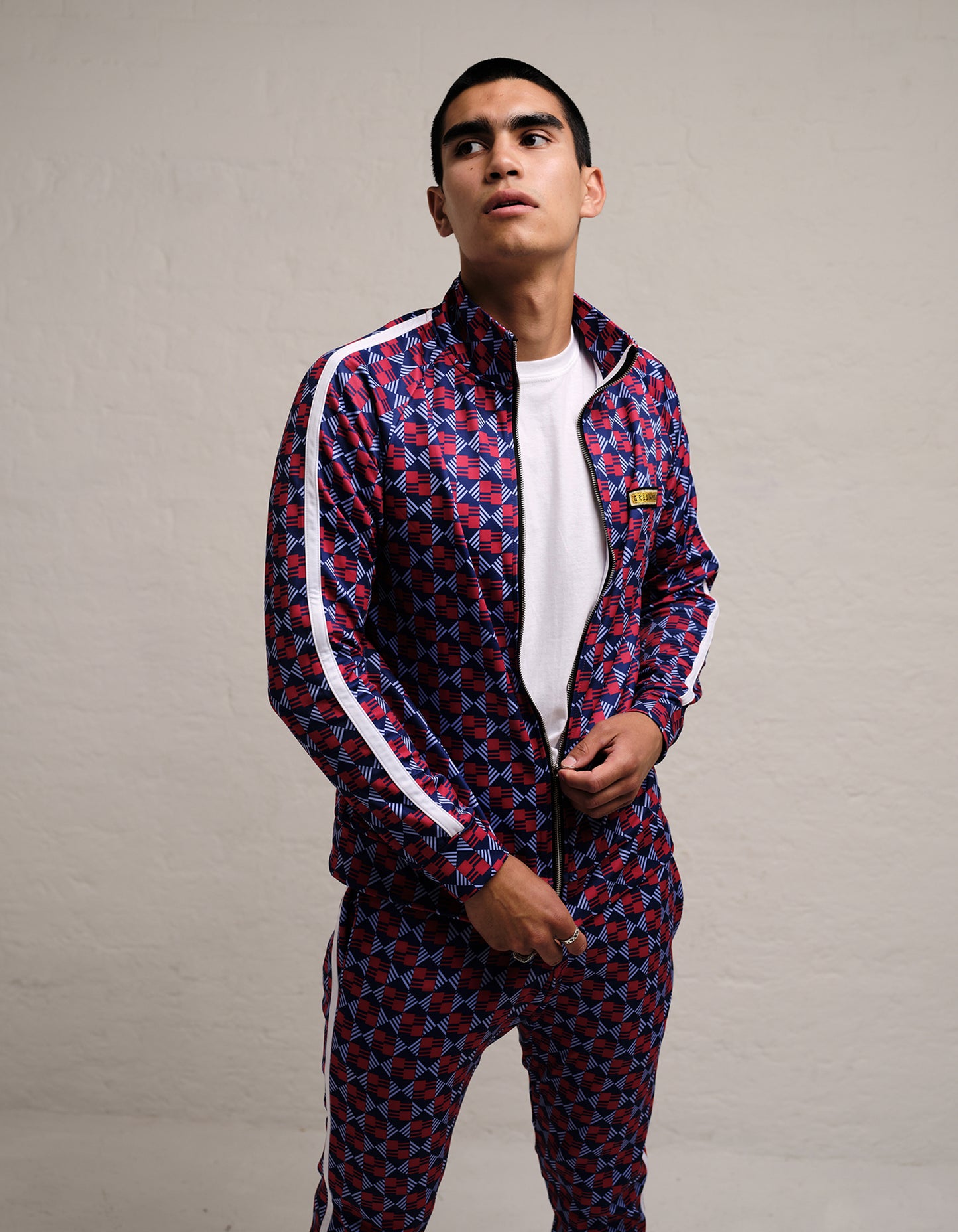 red and grey tracksuit
