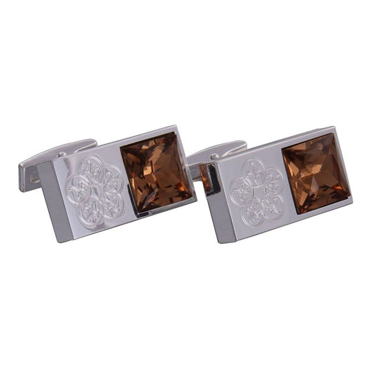 silver and brown cufflinks